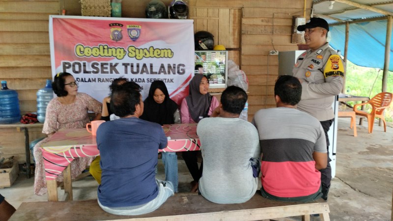 Bhabinkamtibmas Polsek Tualang Intensifkan Cooling System untuk Ciptakan Situasi Kondusif Pilkada 2024