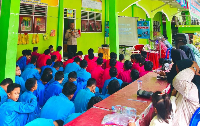 Polsek Kandis Sosialisasikan Pilkada Aman dan Damai kepada Pemilih Pemula