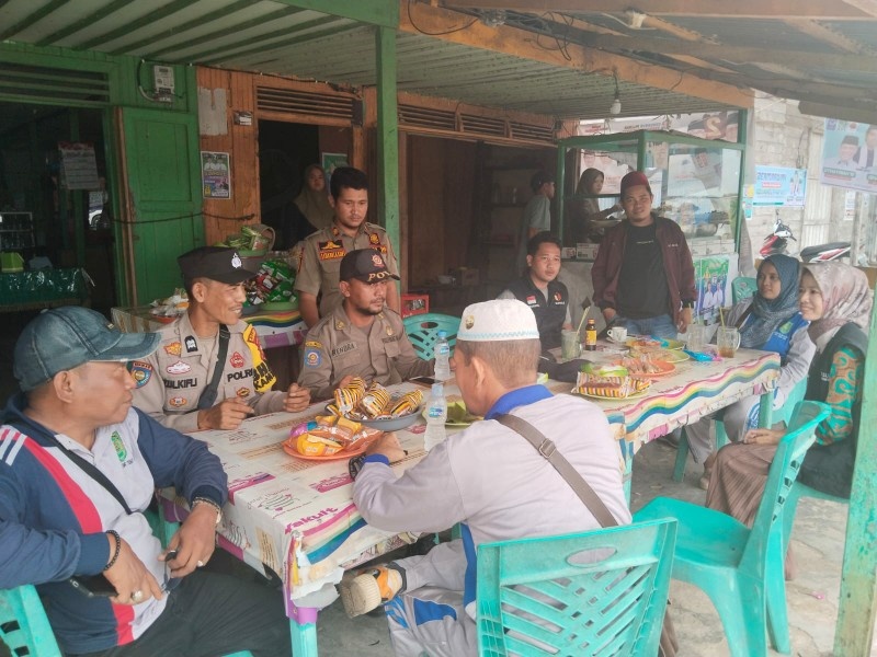 Aiptu Zulkifli Sampaikan Pesan Pilkada Damai Saat Menyapa Warga Kelurahan Sungai Piring