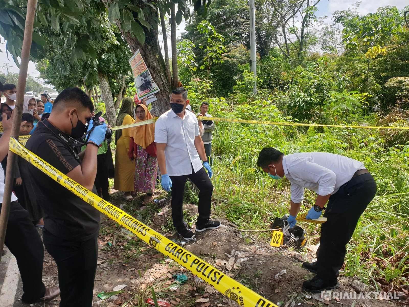Dibungkus Tas Jinjing Hitam, Warga Kampar Temukan Jasad Bayi di Jalan Pekanbaru-Bangkinang
