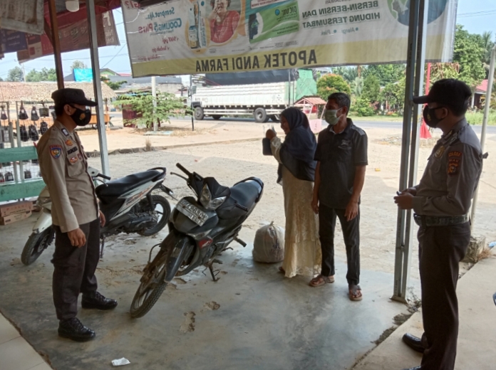 Polsek Pangkalan Lesung Tekankan Protokol Kesehatan Kepada Warga