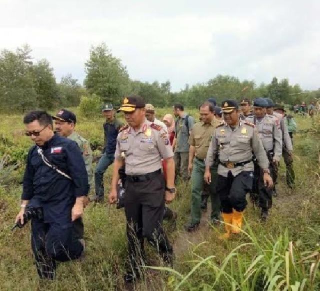 Dalang Pembalakan Liar di Cagar Biosfer Giam Siak Kecil Bengkalis, Dibekuk Tim Reskrim Polda Riau