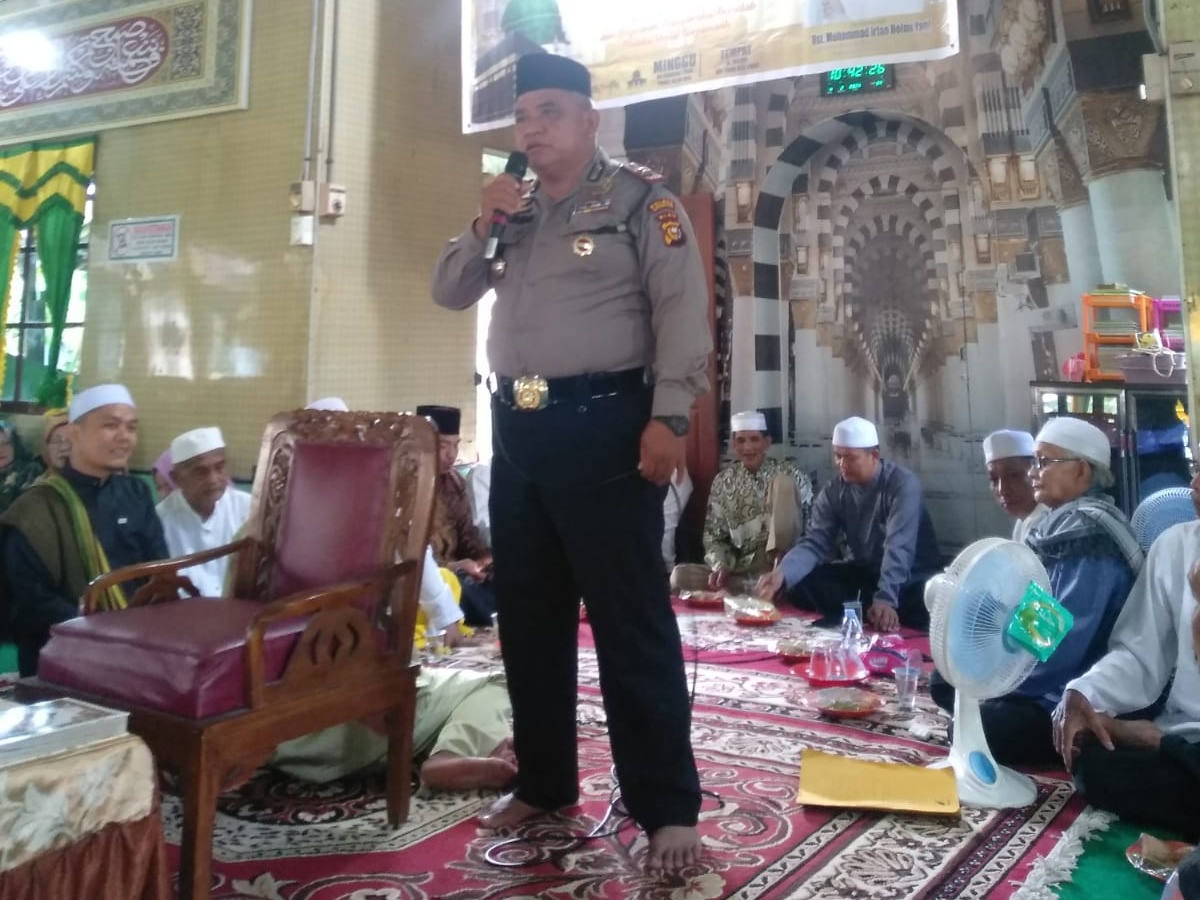 Kapolsek Enok Lakukan Cooling System dan Sosialisasi Pemilu 2024 di Surau Nurul Yakin