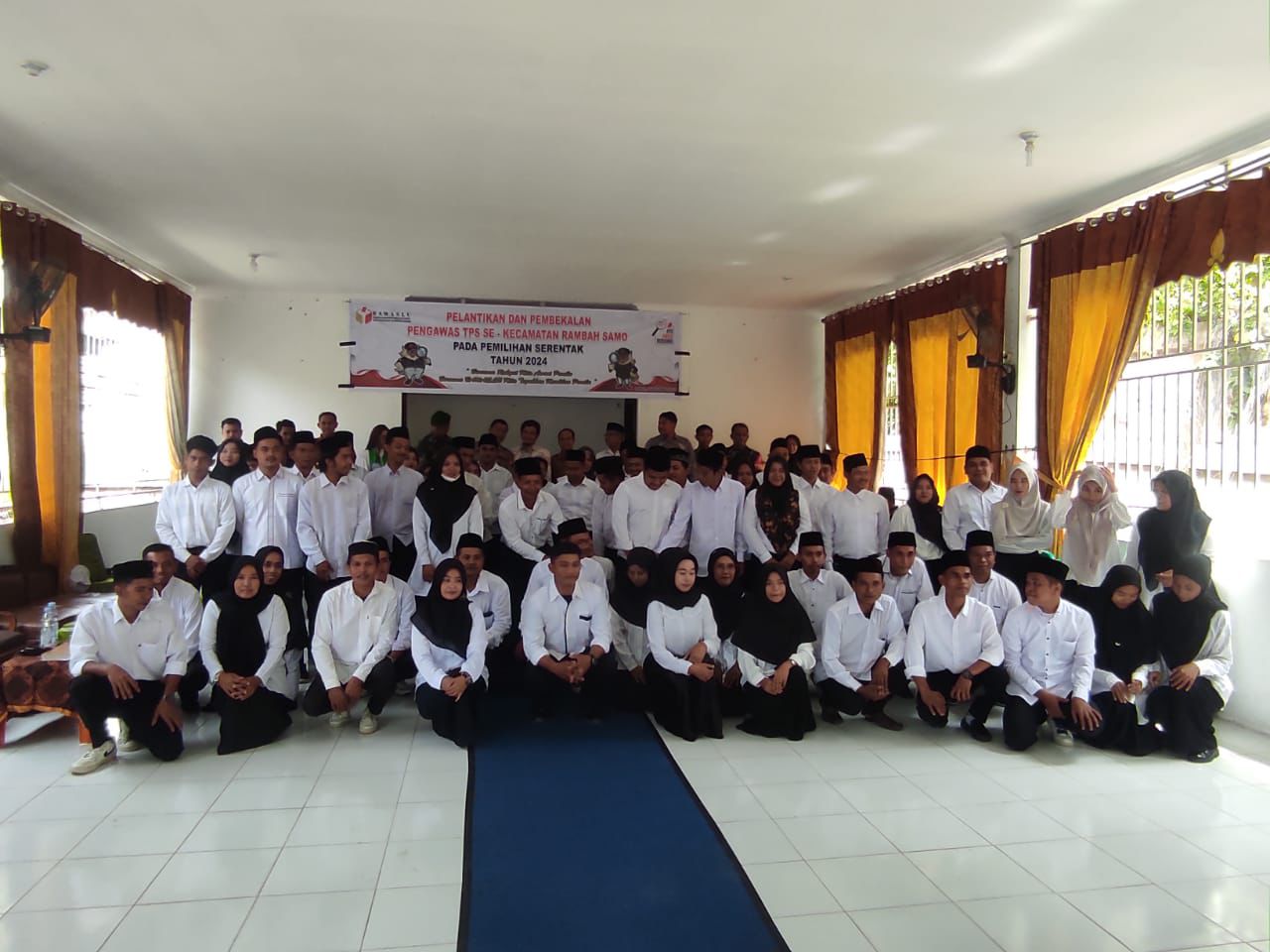 Polsek Bonai DS Sampaikan Pesan Pilkada Damai pada Pelantikan Pengawas TPS Kecamatan Rambah Samo