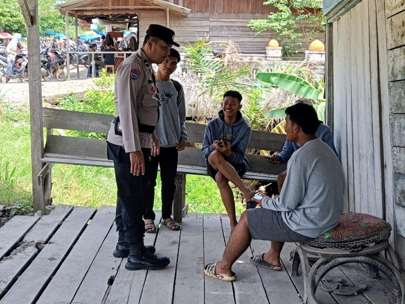 Bhabinkamtibmas Polsek Bangko Pusako Laksanakan Cooling System Pilkada Damai 2024