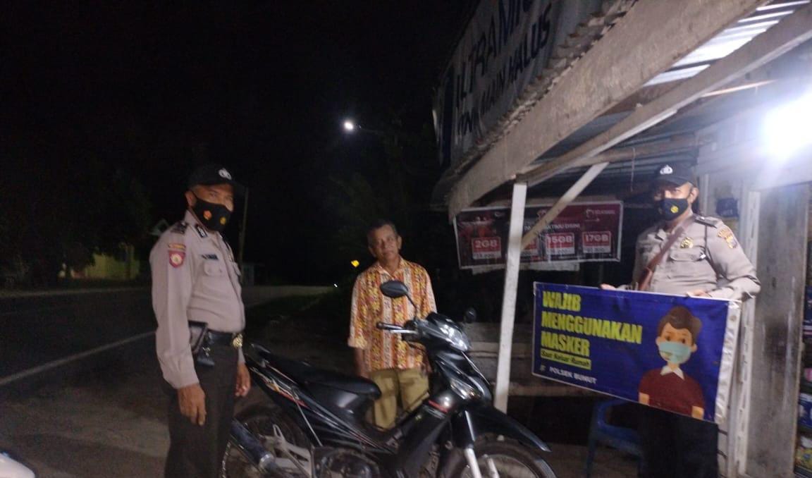 Gelar Sosialisasi Malam, Polsek Bunut Imbau Masyarakat Terapkan Prokes 