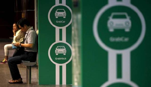 Langkah Pemerintah Atur Tarif Taksi Online Dipertanyakan