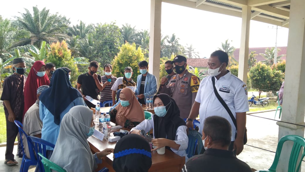 Polsek Ukui Terus Tinjau Laksanakan Vaksinasi di Wilkum 