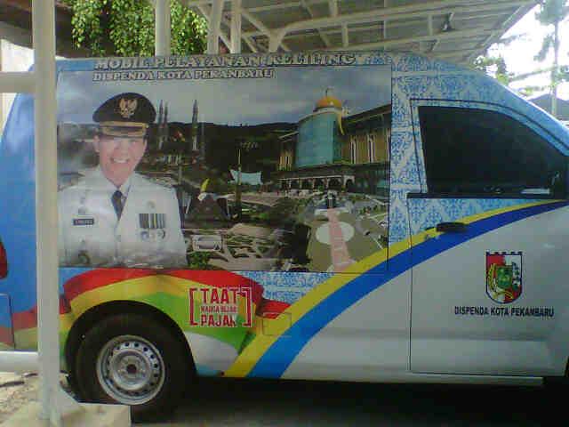 Branding Firdaus MT masih tertempel di mobil keliling Dispenda Pekanbaru, ini kata Panwaslu