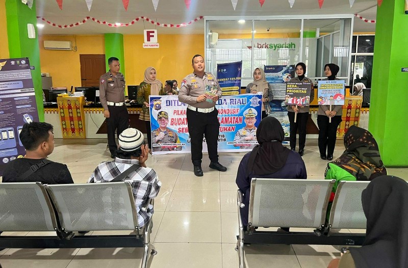 Tim Cooling System Ditlantas Polda Riau Himbau Wajib Pajak Tertib Berlalu Lintas dan Tidak Golput