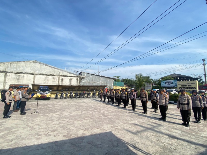 Kapolsek Kandis Pimpin Apel Kesiapan PAM TPS dan Pergeseran Logistik, Tekankan Netralitas Polri pada Pilkada 2024