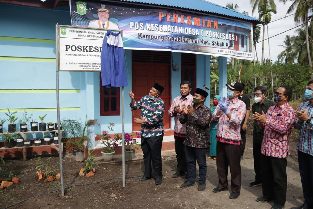 Bupati Alfedri Resmikan Pembangunan Poskesdes Kampung Sabak Permai