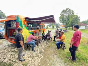 Polsek Minas Ajak Masyarakat Dukung Pilkada Damai Melalui Kegiatan Cooling System