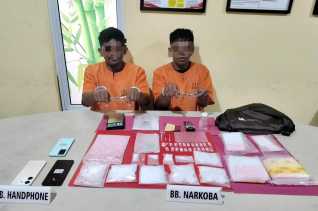 Polres Kampar Tangkap Dua Bandar Narkoba, Sita Setengah Kilogram Sabu dan Ratusan Ekstasi