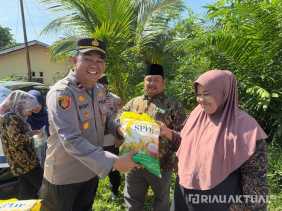 Gerakan Pangan Murah Polri, Polsek Tanah Putih Tanjung Melawan Salurkan 1 Ton Beras SPHP