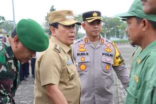 Polres Rohul Gelar Apel Akbar Linmas dan Pergeseran Pasukan PAM TPS