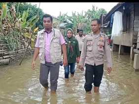Dokkes Polres Kuansing dan IDI Berikan Pengobatan Gratis Pasca Banjir