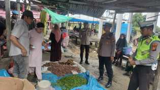 Kapolsek Bonai Pesankan Pemilu Damai di Pasar Tradisional