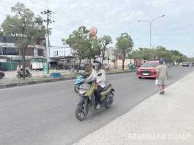 Kabut Asap Mulai Selimuti Pekanbaru, Warga Keluhkan Sesak dan Gunakan Masker