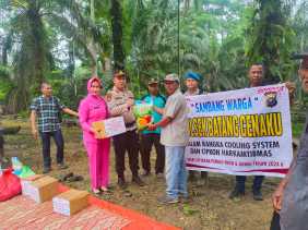 Kapolsek Batang Cenaku Gelar Cooling System dan Salurkan Bansos di Lahai Kemuning